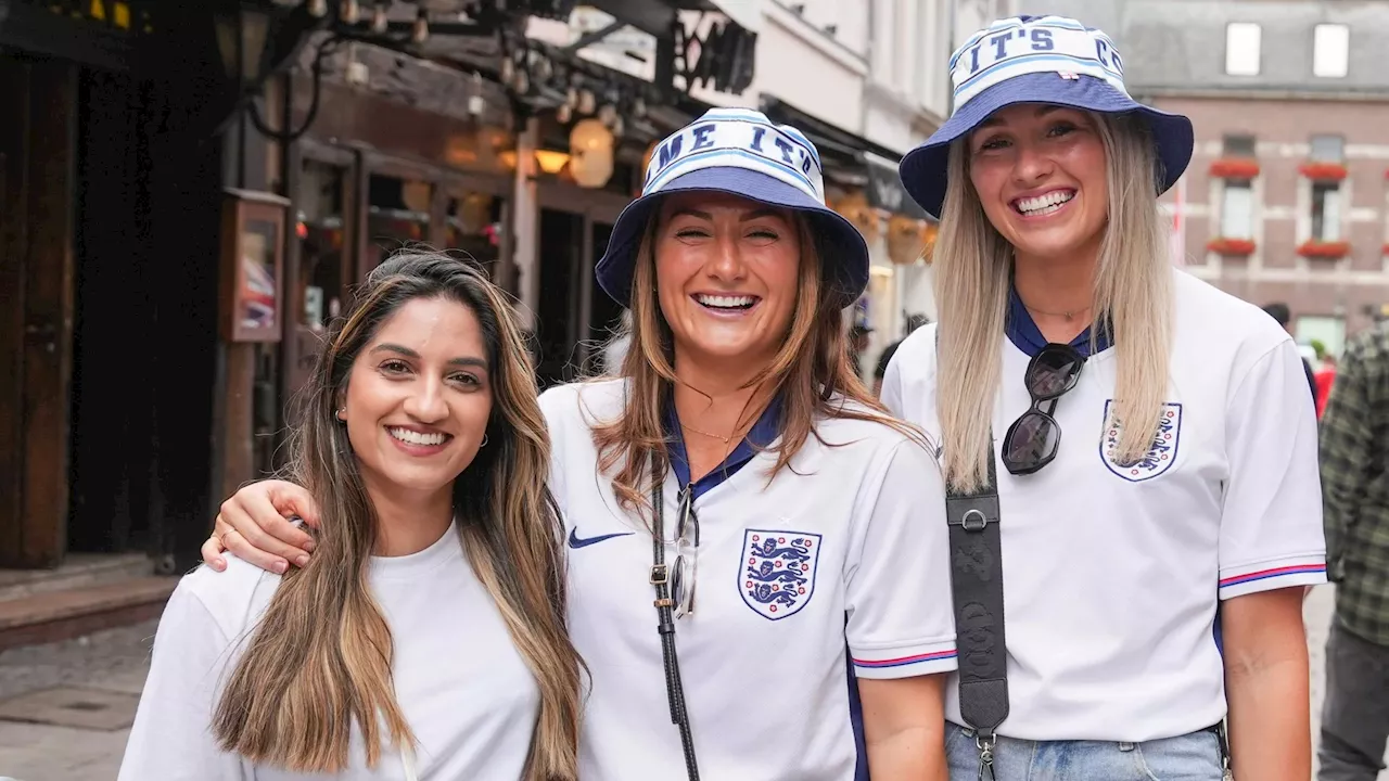 Excited England fans are all smiles as they eagerly await crunch Euros quarter-final clash with Switzerland...