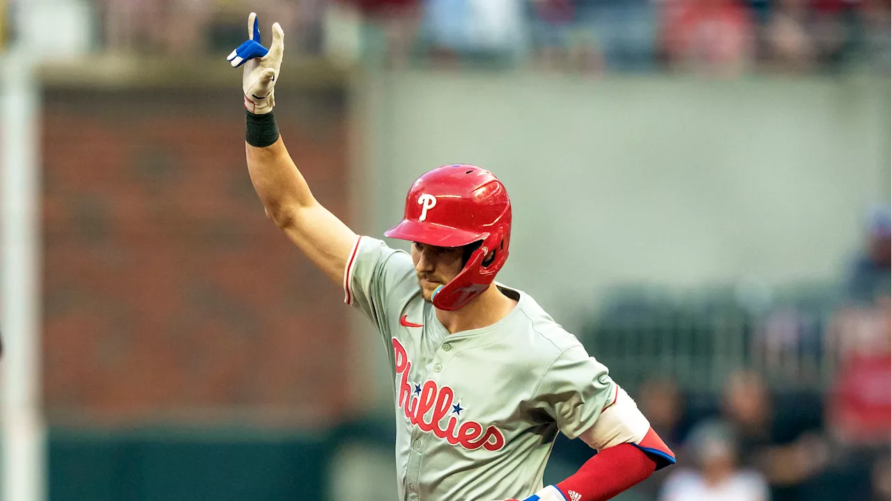 Turner homers twice, Nola gets 100th career win in Phillies' victory over Braves