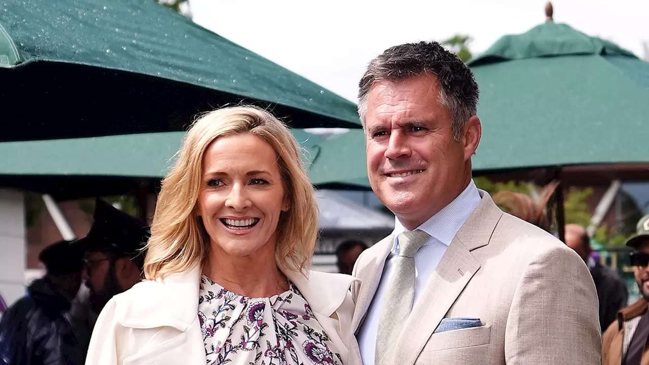 Gabby Logan dazzles in a purple floral maxidress as she joins husband Kenny at Wimbledon after...