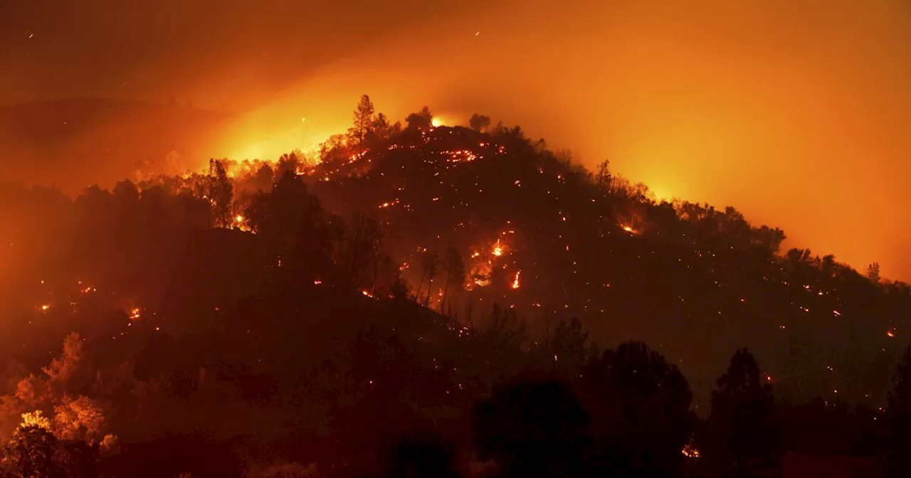 Wildfires rage in California as heat wave bakes much of the Western US