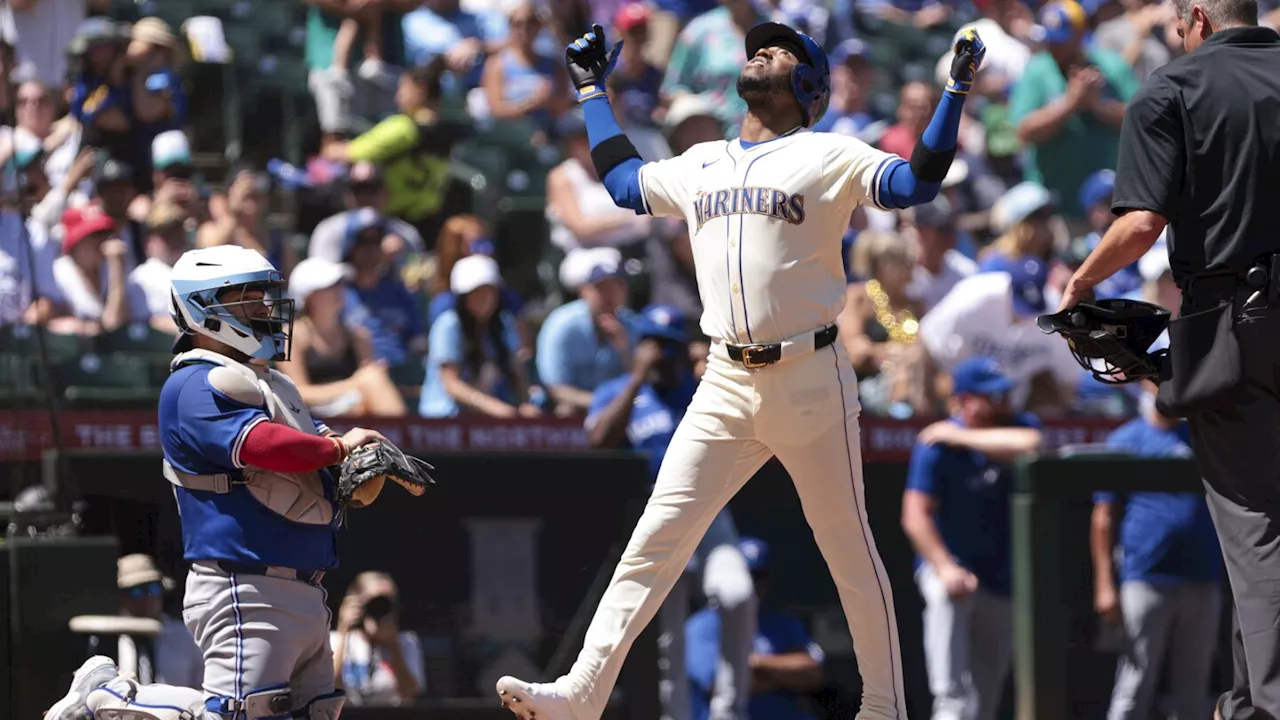 Varsho's RBI single in the 10th lifts Toronto to 5-4 win over Seattle.