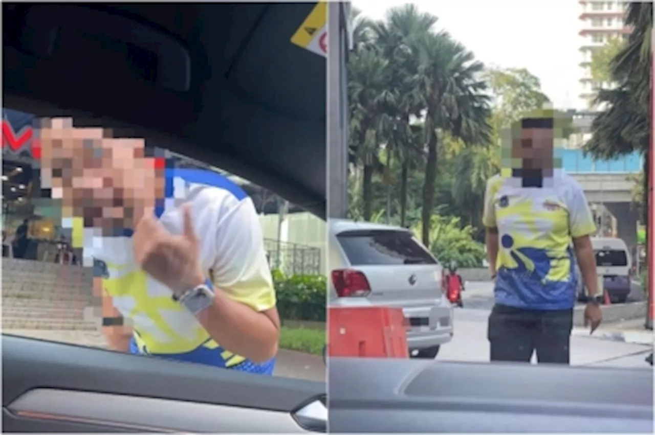 Cops say man shown parking in restricted area not an officer, just wearing police fun run tee