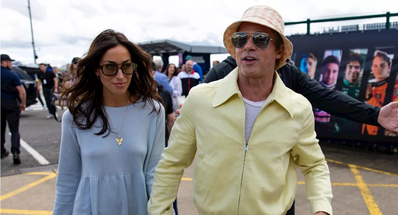 Brad Pitt and Girlfriend Ines de Ramon Coordinate in Pastel Colors for F1 British Grand Prix