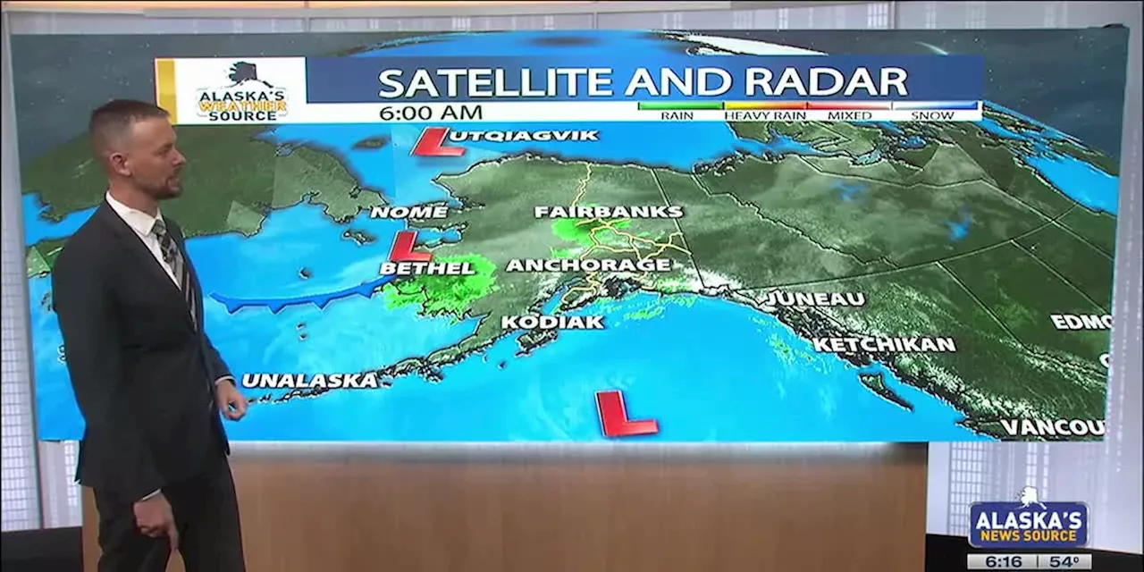 Slow warming this week, with rain showers sticking around