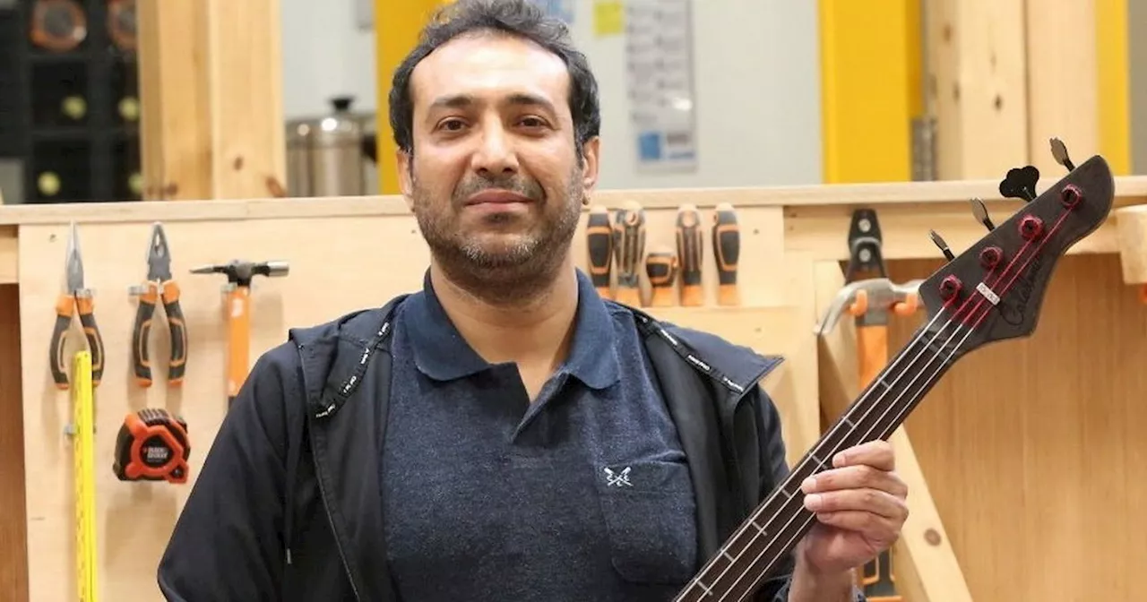 Iranian refugee in Scotland creates tartan guitar as thank you to locals