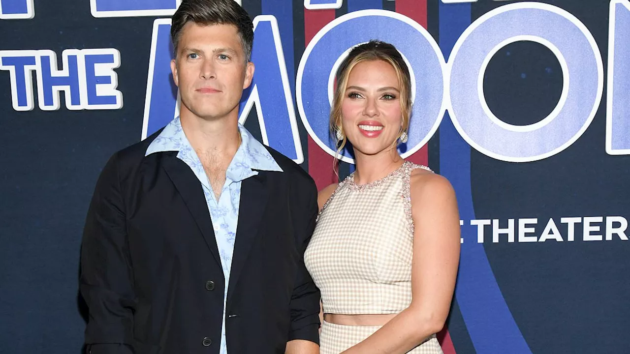 Scarlett Johansson and husband Colin Jost get loved up on the red carpet for her new film Fly Me To...