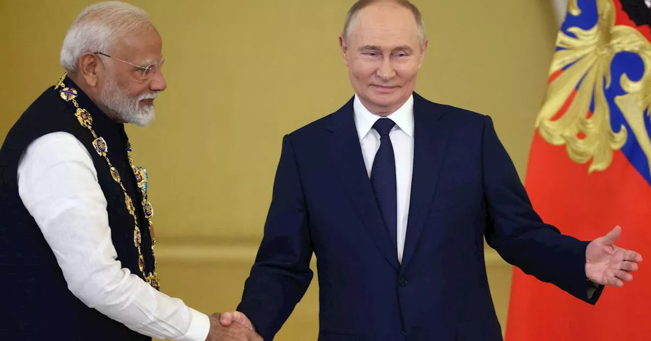 Ukraine condemns Indian leader for embracing Putin after deadly missile barrage