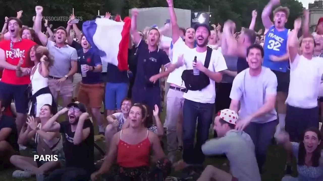 French fan zone explodes in cheers as Leon Marchand clinches second Olympic gold