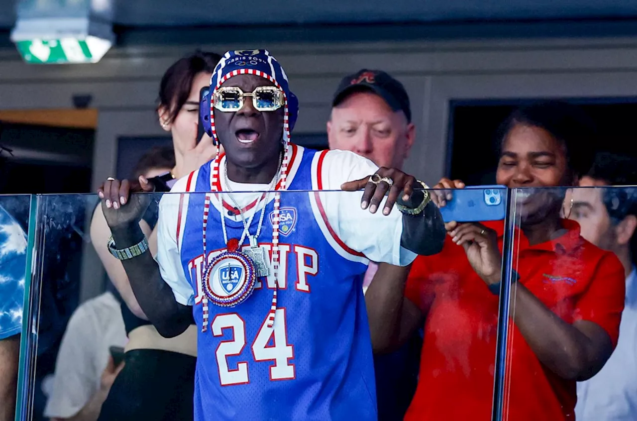 Flavor Flav Celebrates Beginning of August at the 2024 Olympics With Taylor Swift Lyric