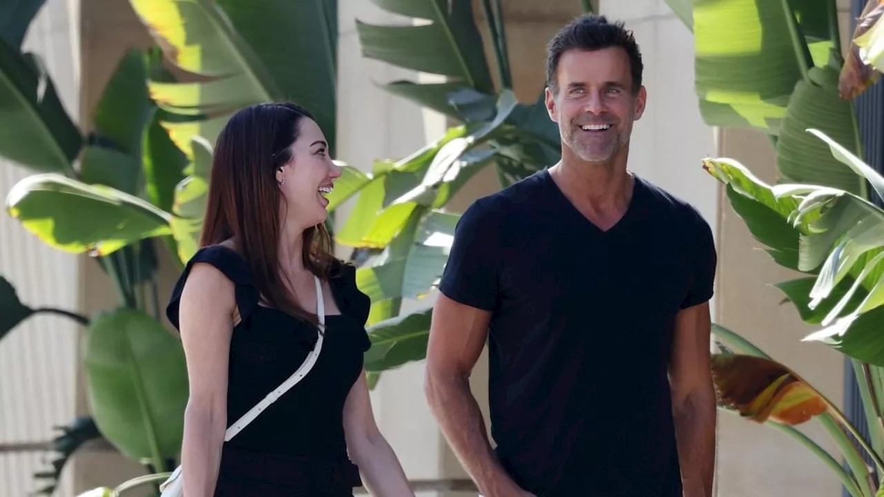 General Hospital's Cameron Mathison is seen out with female pal just hours after announcing divorce...