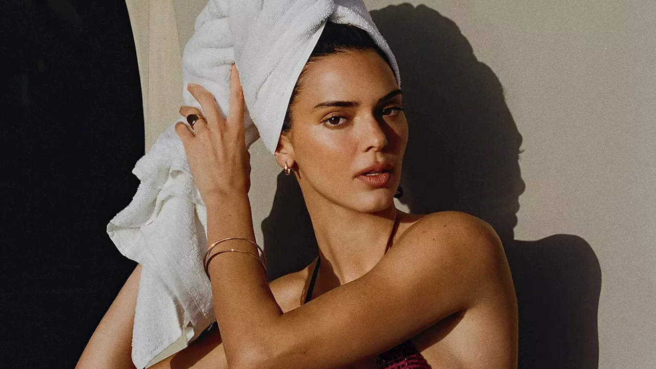 Kendall Jenner says being a model can be 'lonely' and admits she has had some 'dark nights' where...