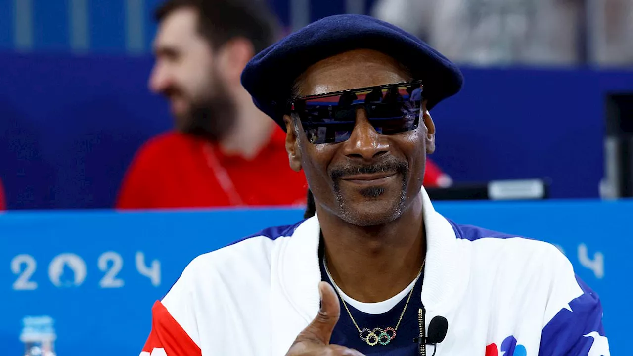 Snoop Dogg is in high spirits watching USA judo team at the Olympics Games in Paris wearing a...