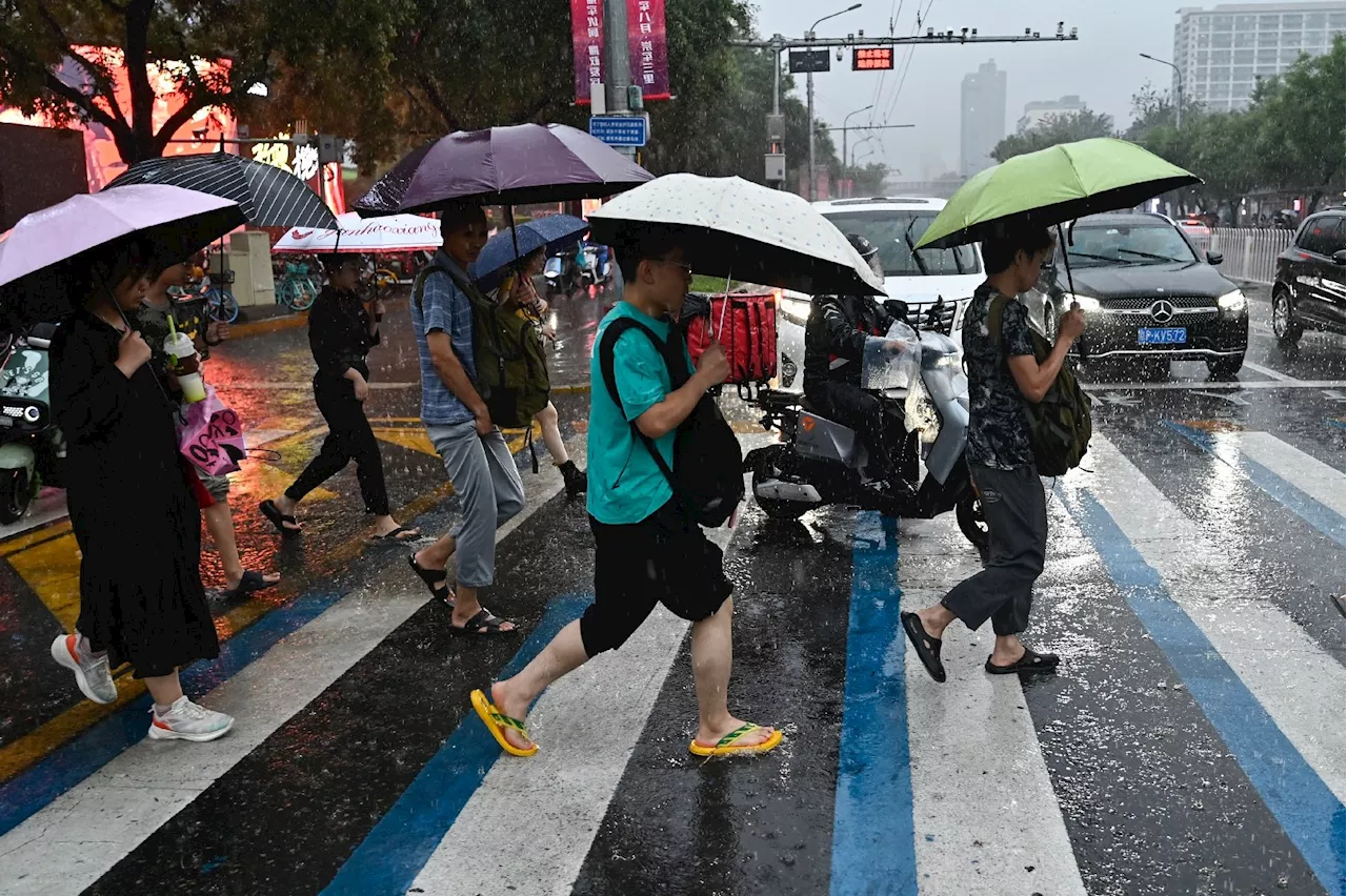 En Chine, des pluies torrentielles font au moins 30 morts, canicule à Shanghai