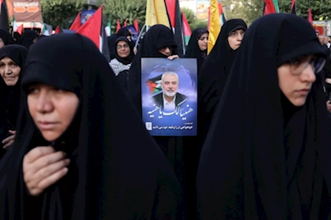 Calls for revenge as thousands mourn at Iran funeral procession for slain Hamas chief Ismail Haniyeh