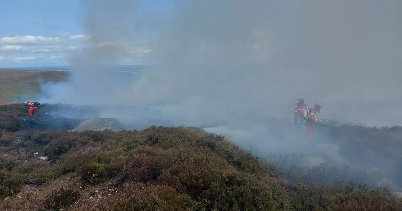 Several kilometres of hot spots remain after huge moorland blaze