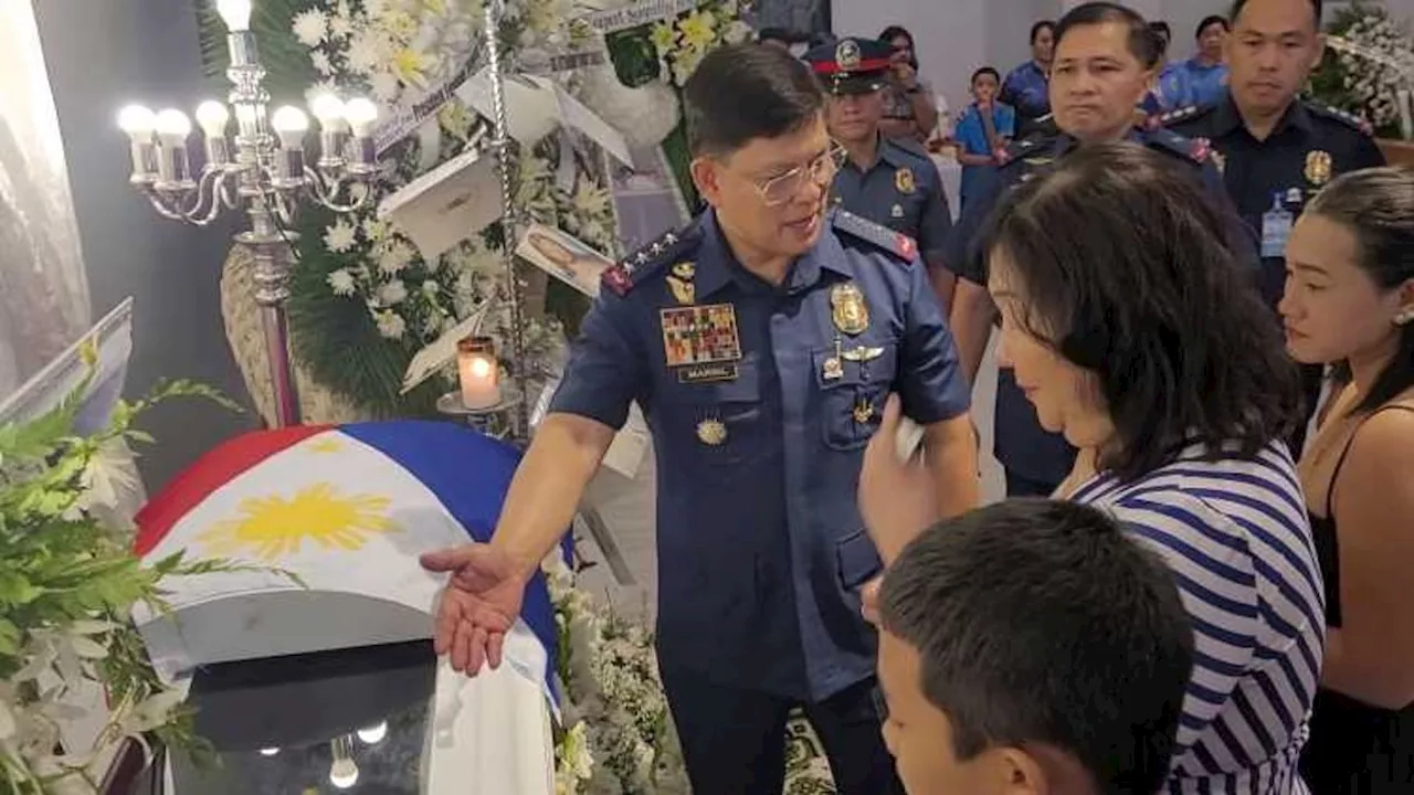 Marbil honors cop killed by minor gang member