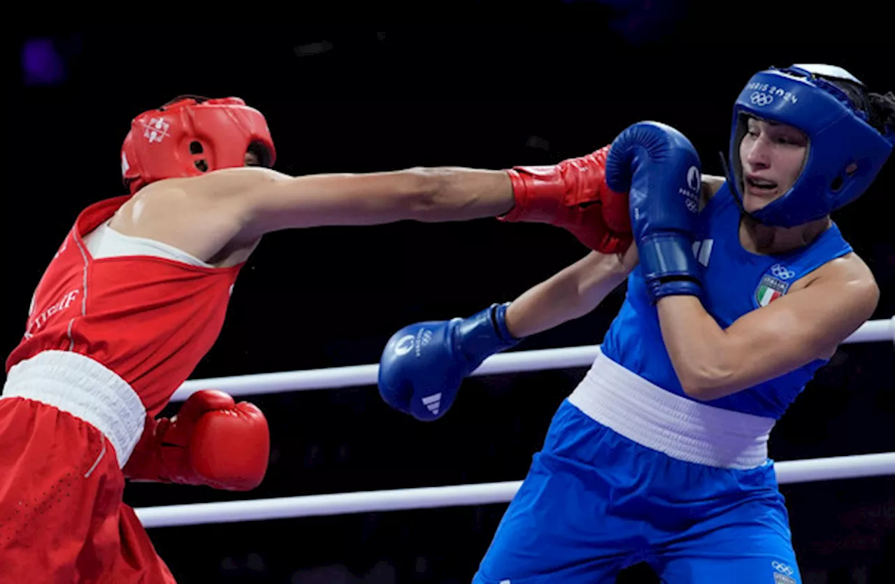 Algerian boxer in Olympic gender row wins in 46 seconds