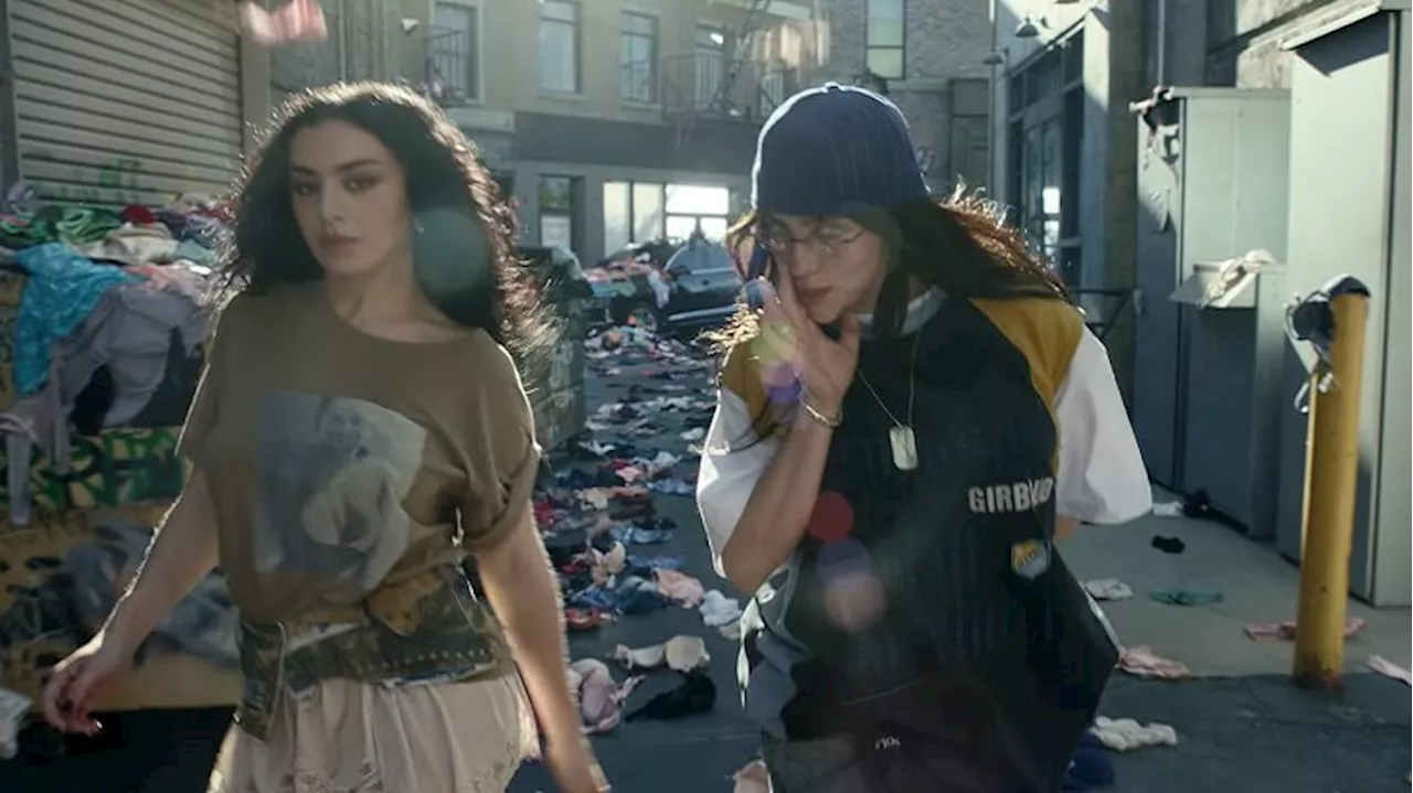 Charli XCX and Billie Eilish play with underwear, big trucks in 'Guess' music video