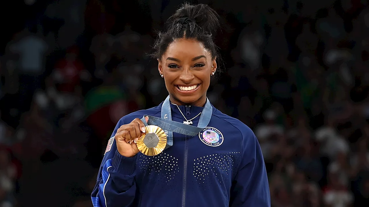 Simone Biles labeled ‘such a queen’ for ‘making history again’ as USA superstar powers to second gold medal...