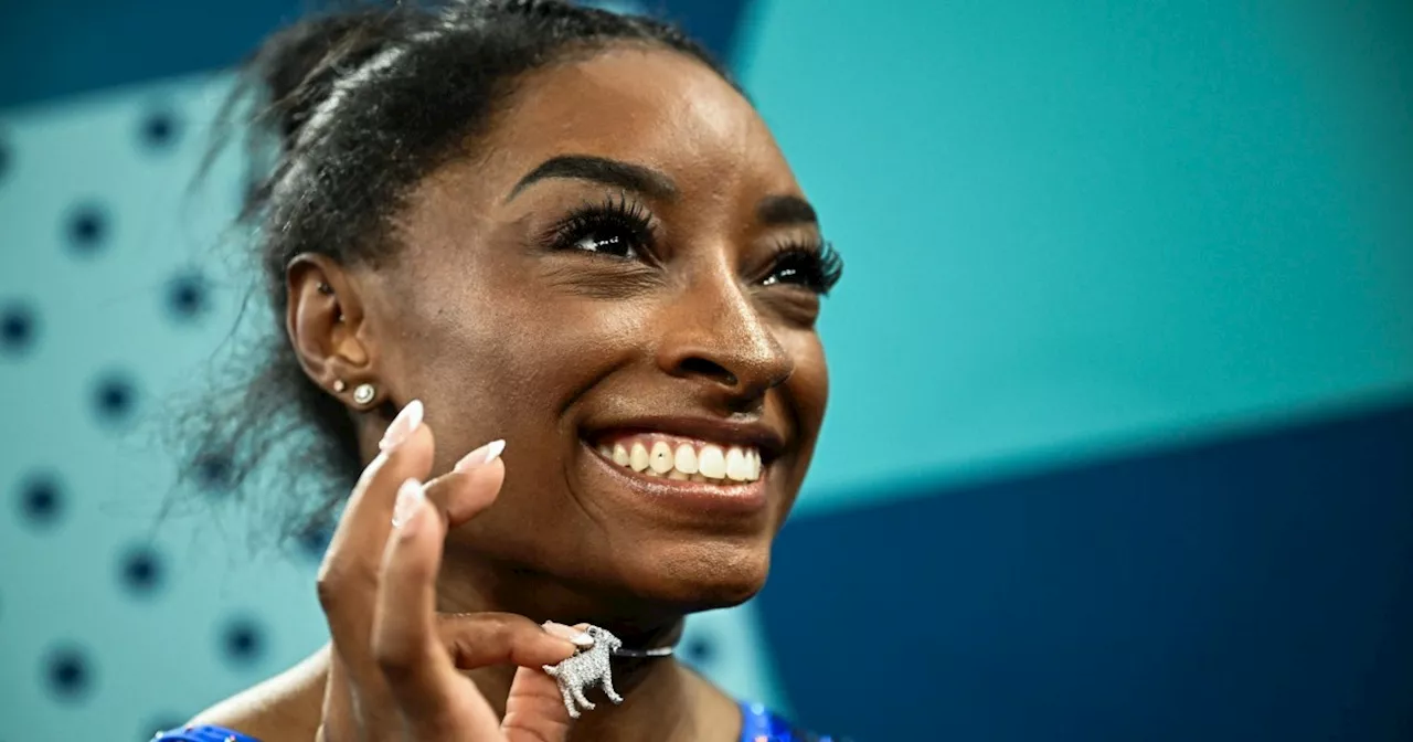 Simone Biles Celebrates GOAT Status With Diamond Goat Necklace At Paris Olympics