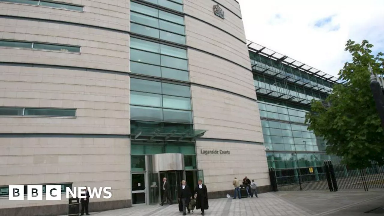 Four appear in court over rioting in Belfast