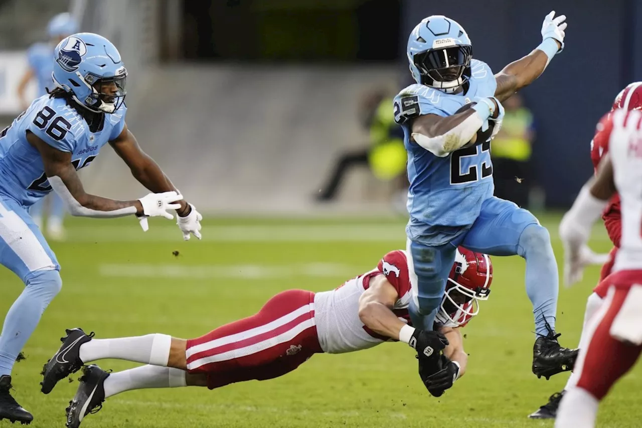 DaShaun Amos. Janarion Grant score key TDs to rally Argos past Stampeders 39-25