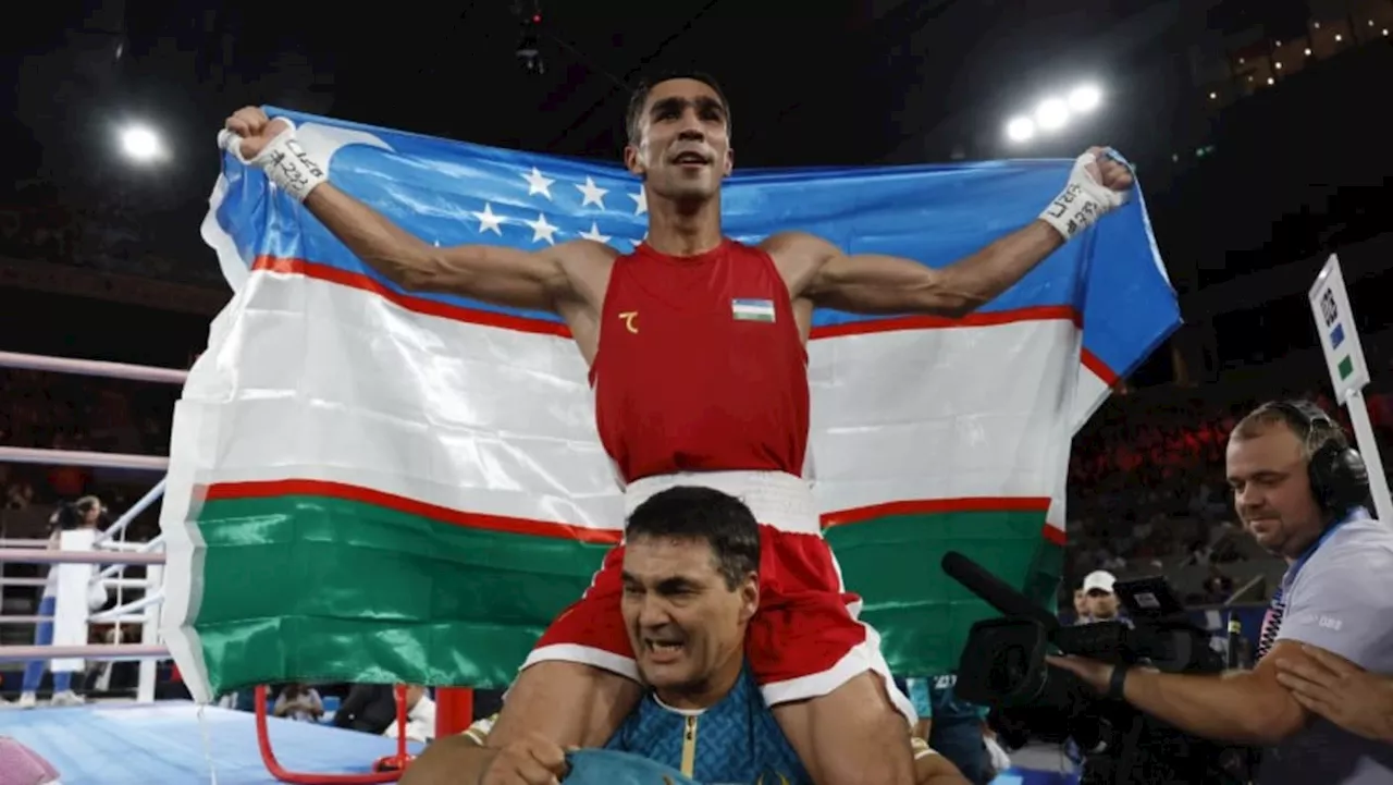 Uzbekistan's Khalokov wins men's featherweight gold