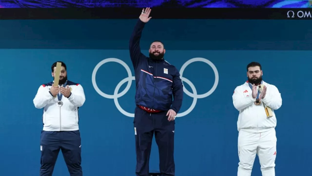 Weightlifting-Georgia's Talakhadze wins his third gold medal