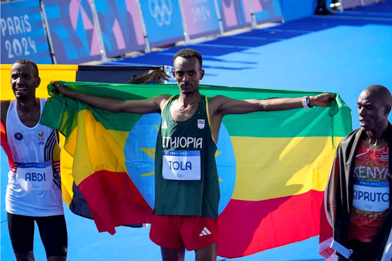 Olympics Ethiopian runner Tamirat Tola wins men's marathon at Paris