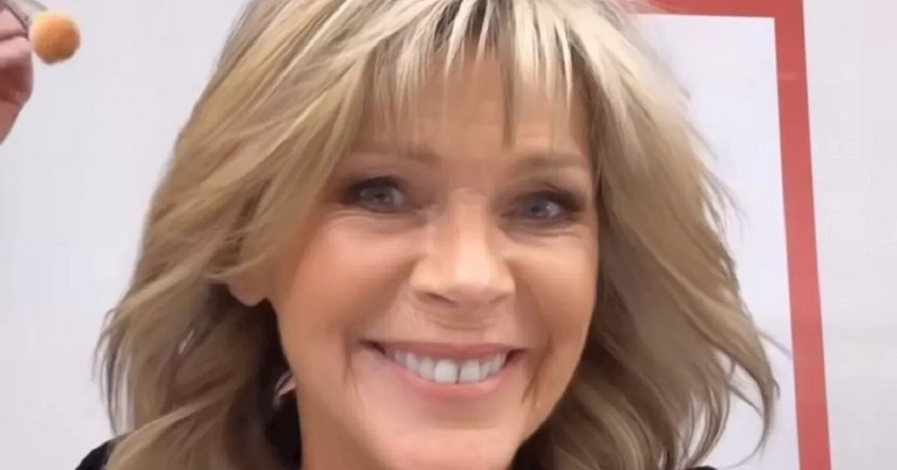 Single Ruth Langsford sings about 'love' as she makes care-free appearance