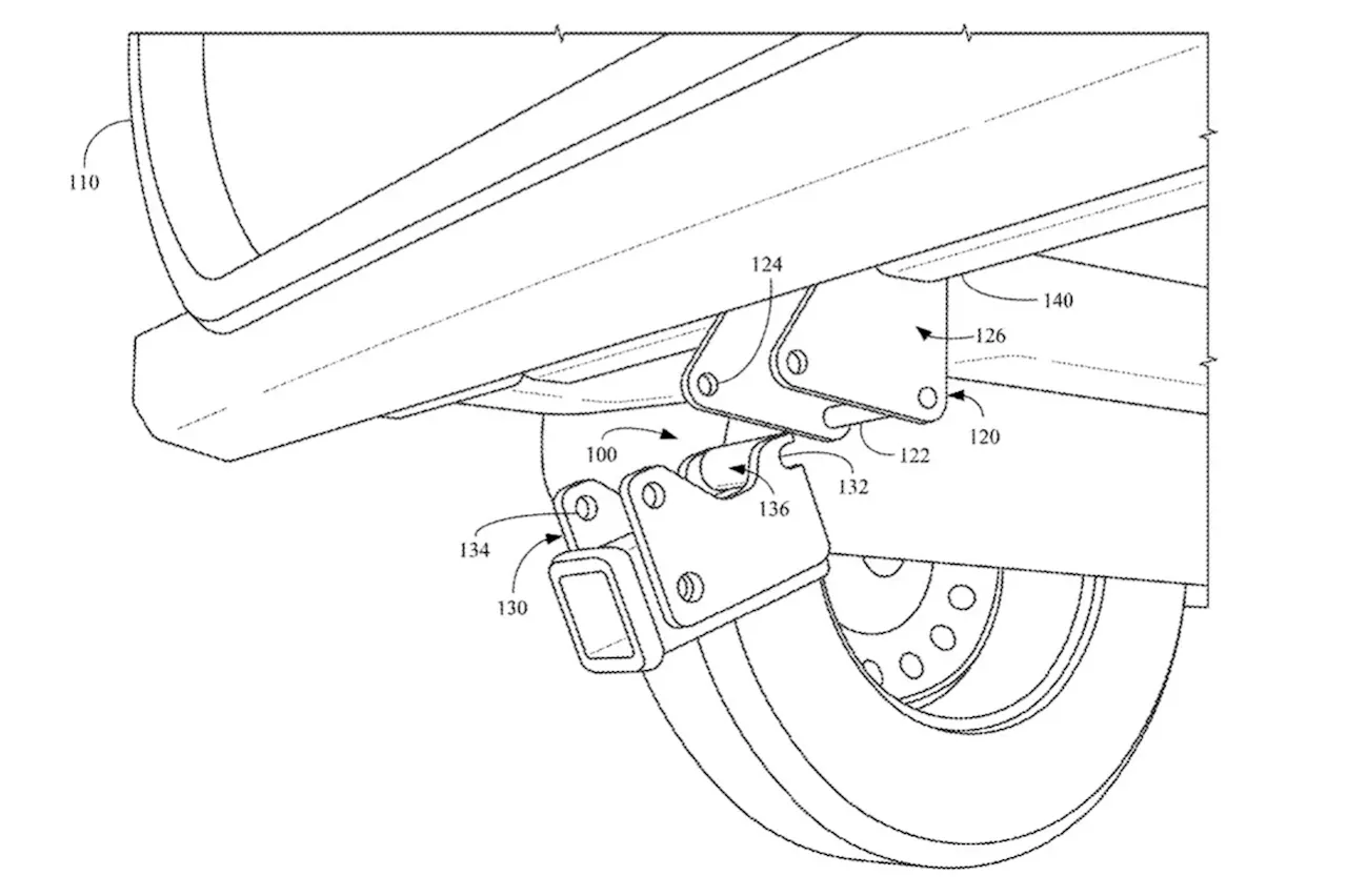 Rivian designing accessory system with removable hitch assembly