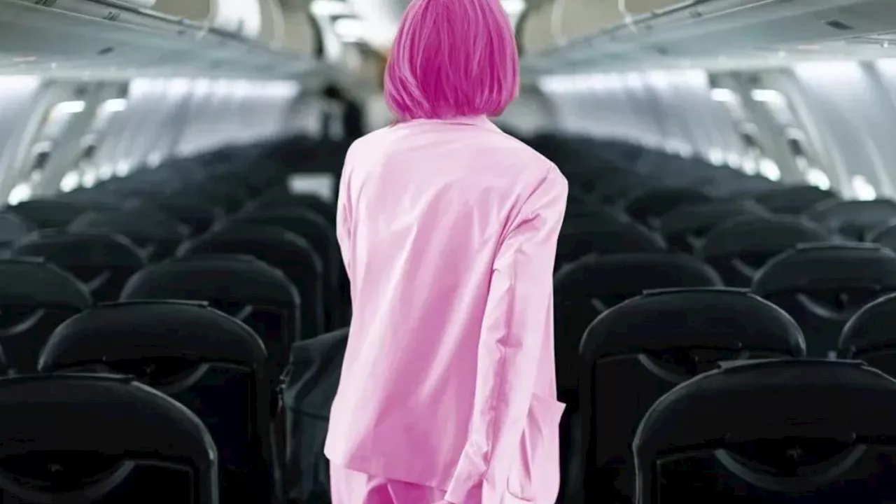 Travel expert reveals why you should stand as soon as the plane lands...