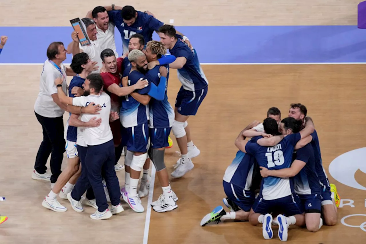 After muted celebration in Tokyo, France turns Paris into party central with volley gold