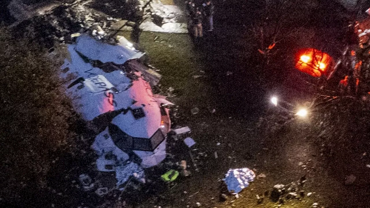 Families of Brazil plane crash victims gather in Sao Paulo as experts work to identify the dead