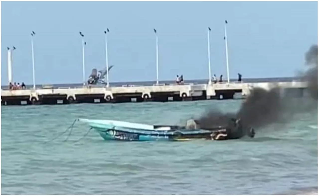 Yucatán: Alcalde de Telchac Puerto 'aplaude' quema de lancha en enfrentamiento de pescadores por captura de pulpo