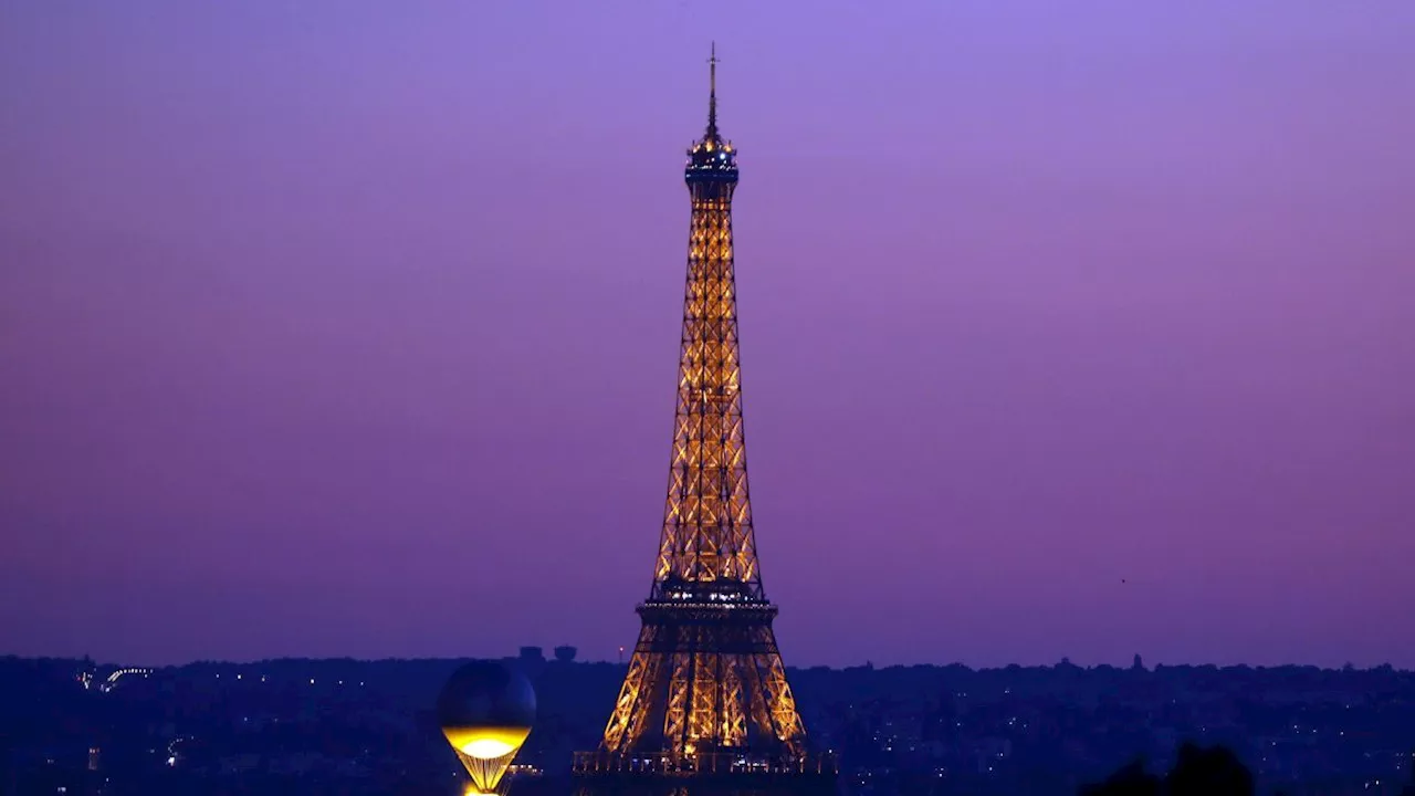 Man climbing Eiffel Tower prompts evacuation before Olympics closing ceremony