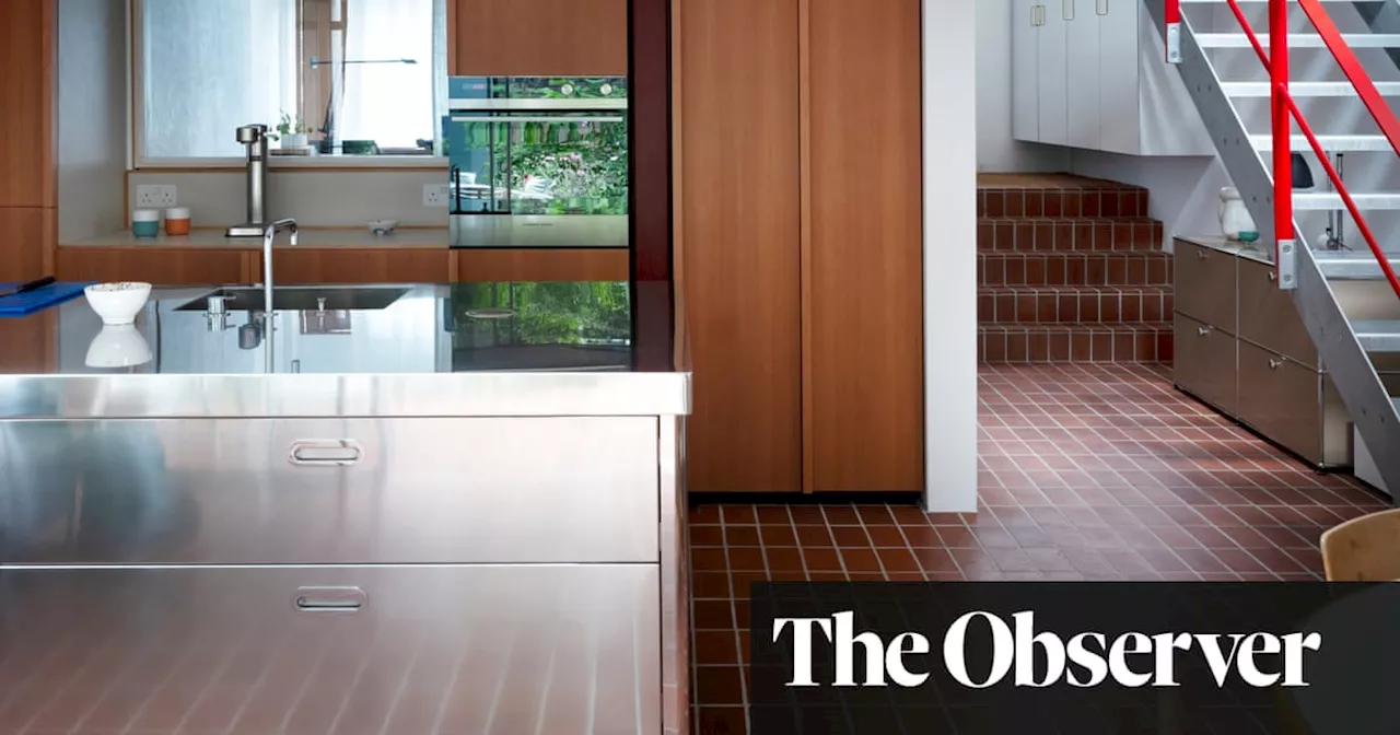 Brick floors and white tiles revive an East London house