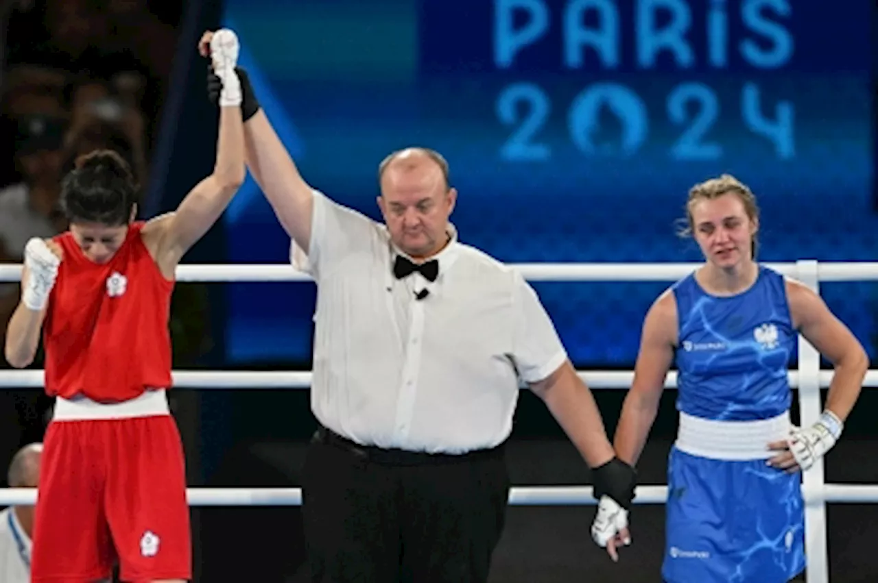 Taiwan’s Lin sobs as she joins Khelif to also win Olympic gold in women’s boxing despite venom over gender row