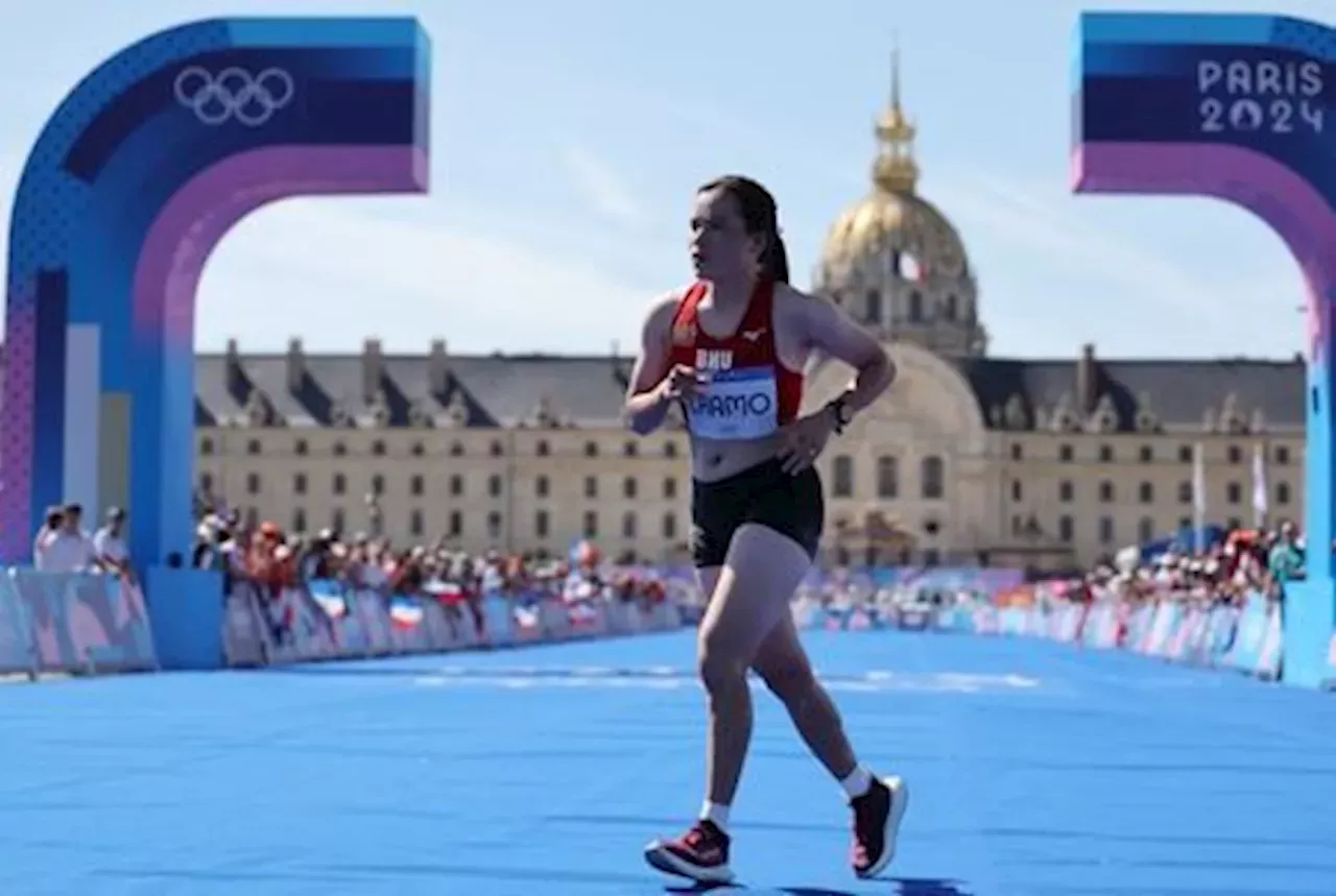 OlympicsAthleticsBhutan's marathon runner gets standing ovation for