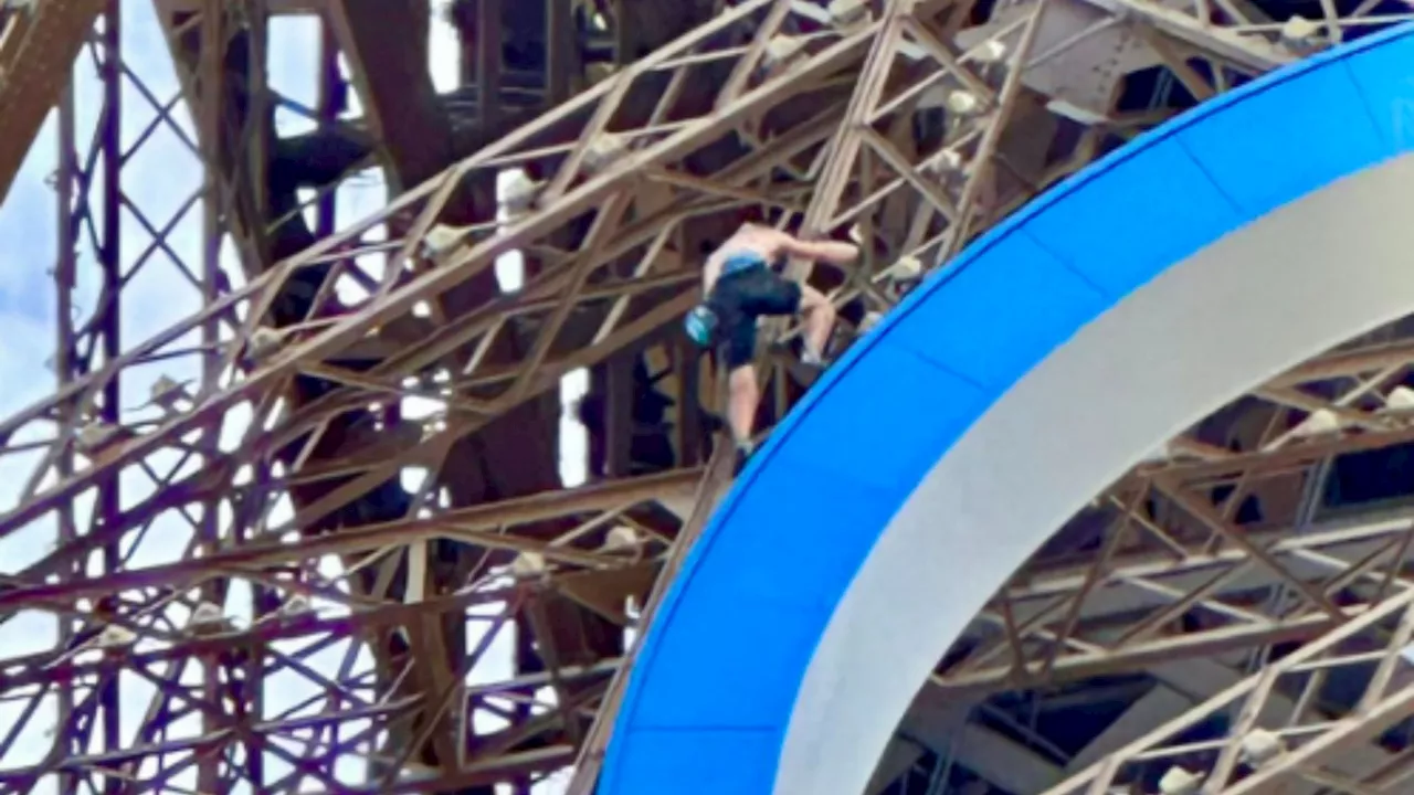Eiffel Tower evacuated hours before Olympics closing ceremony in Paris as shirtless man seen climbing...