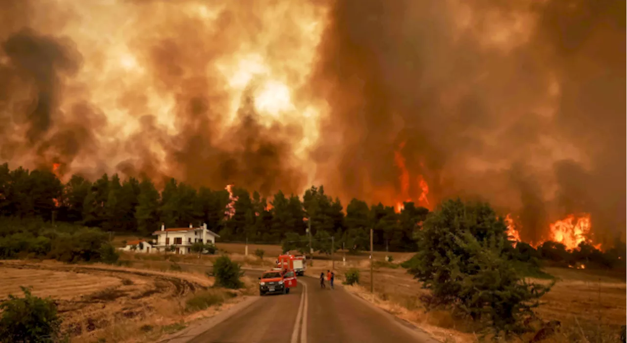 Greek wildfires engulf mountain as they approach capital Athens