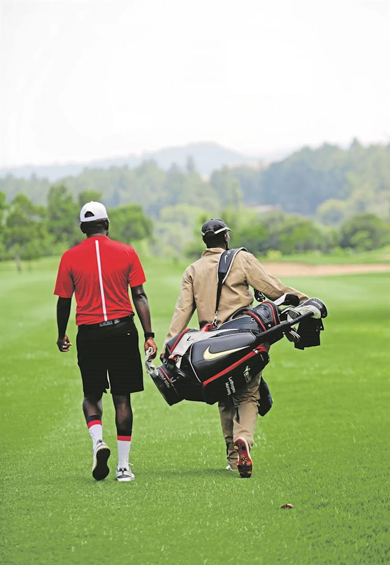 Why South Africa's golf caddies are still treated like cheap, unskilled labour