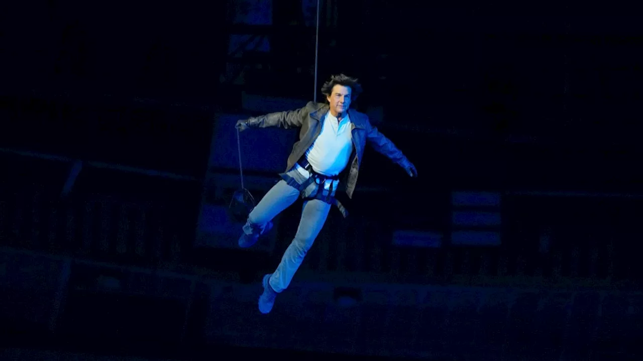 Tom Cruise performs crazy stunt jump from stadium roof during Olympics closing ceremony