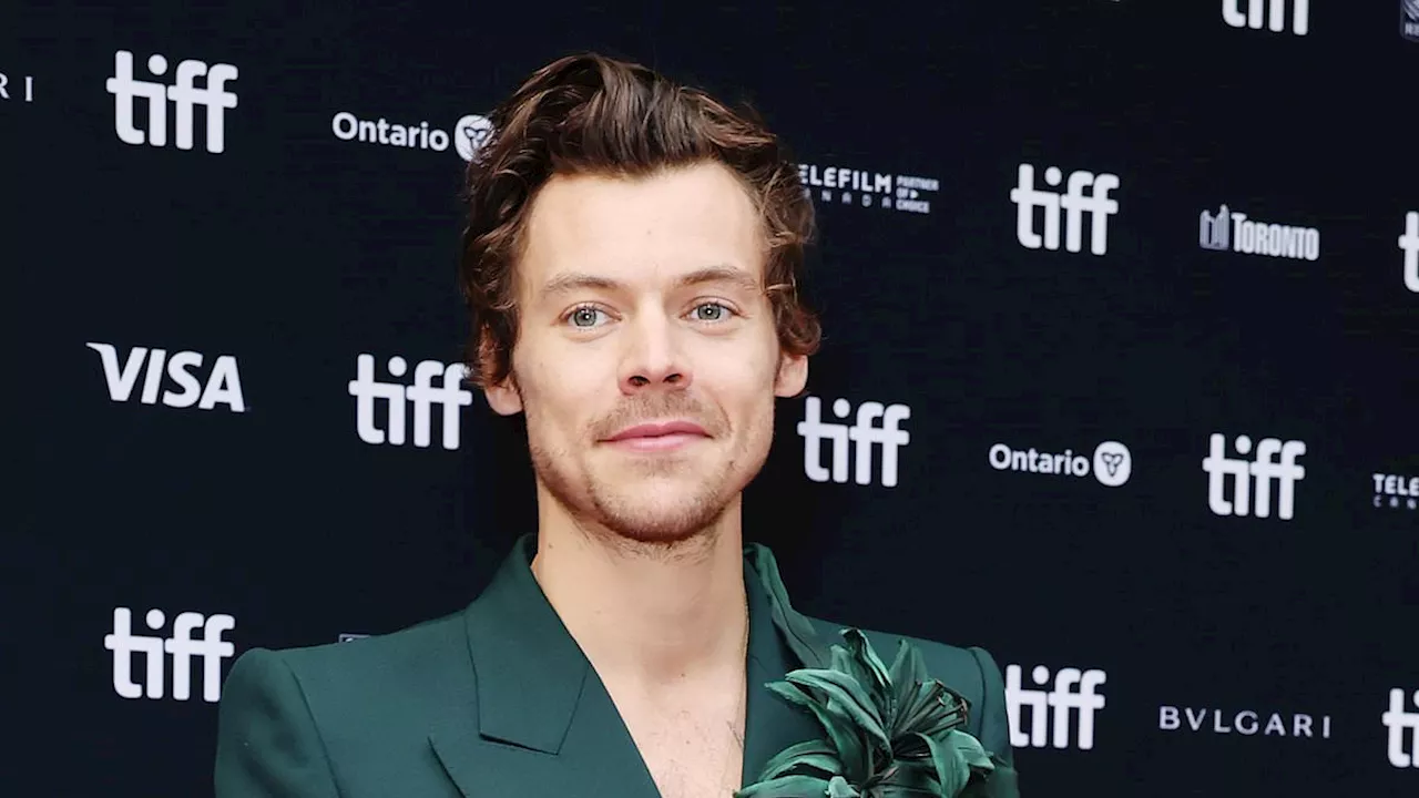 Harry Styles sends fans wild as he is spotted getting burgers at Five Guys with soul singer Olivia...