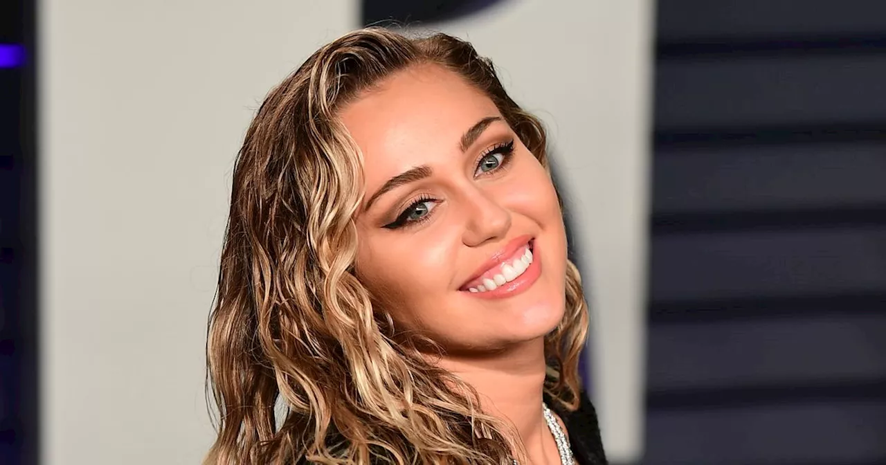 Miley Cyrus breaks down in tears and says 'I wasn't created in a lab'