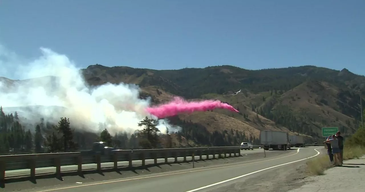 Wildfire along California-Nevada line near Reno destroys 1 home, threatens hundreds more