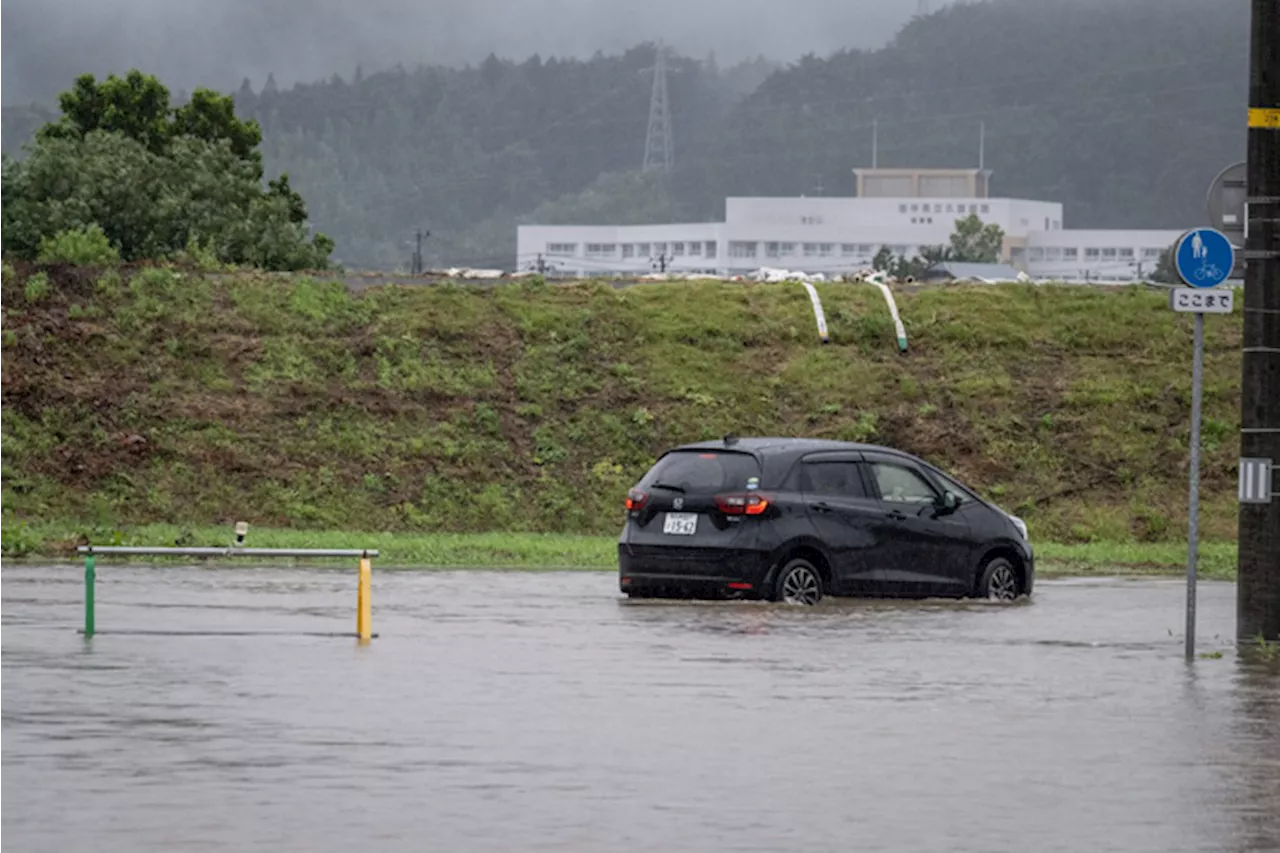 Tropical storm Maria hits Japan with record rain