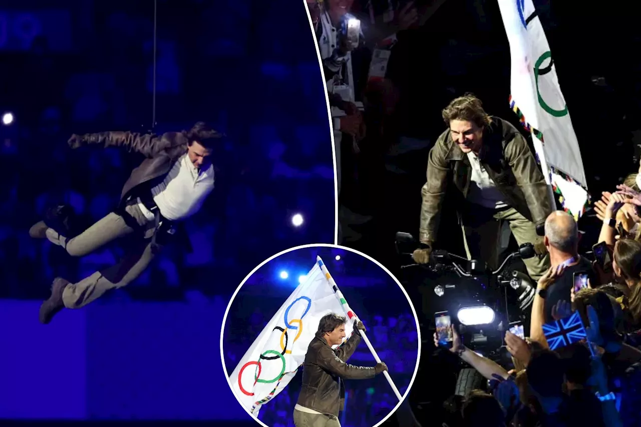 Tom Cruise rappels down from roof for Olympic flag at dramatic Paris closing ceremony, rides off on motorcycle to pass torch to Los Angeles for 2028