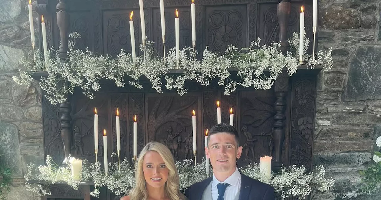 Mayo star Conor Loftus pictured with girlfriend Roisin at Aidan O'Shea's wedding