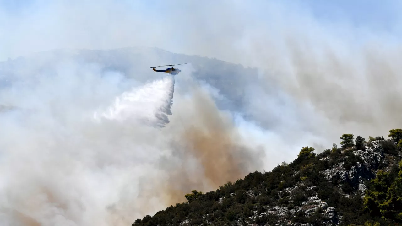 Catastrophic fires rage across Athens as Greece calls for EU help